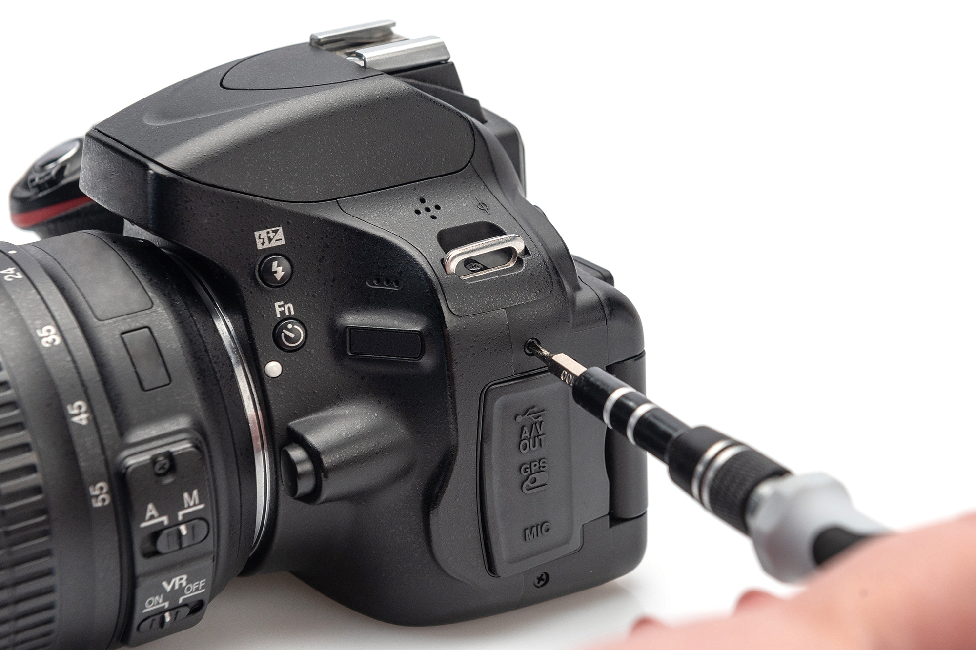DSLR, Kamerabody, Objektiv, USB-Port, Batteriegriffbereich