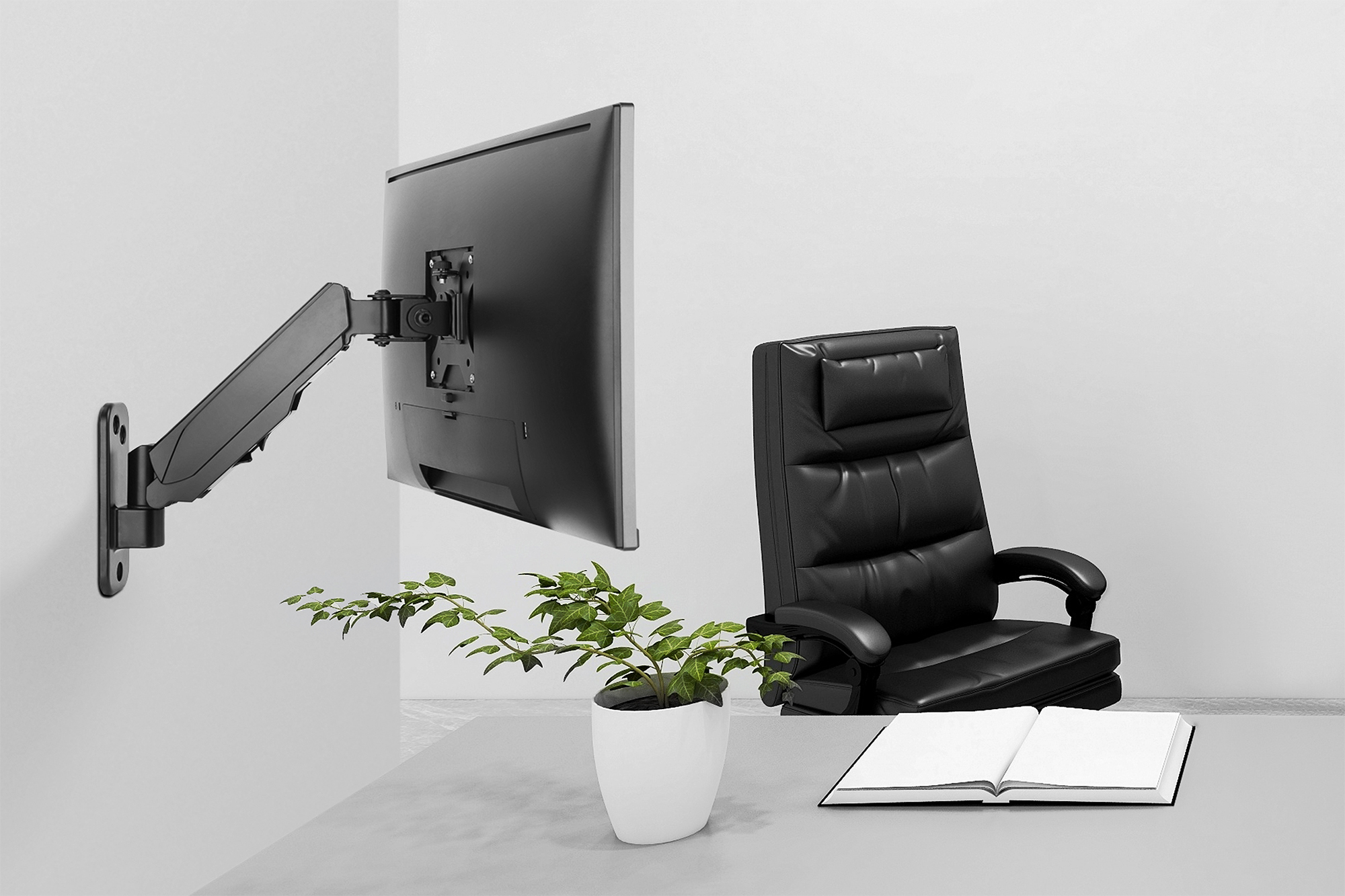 monitor, office chair, desk setup, plant, open book