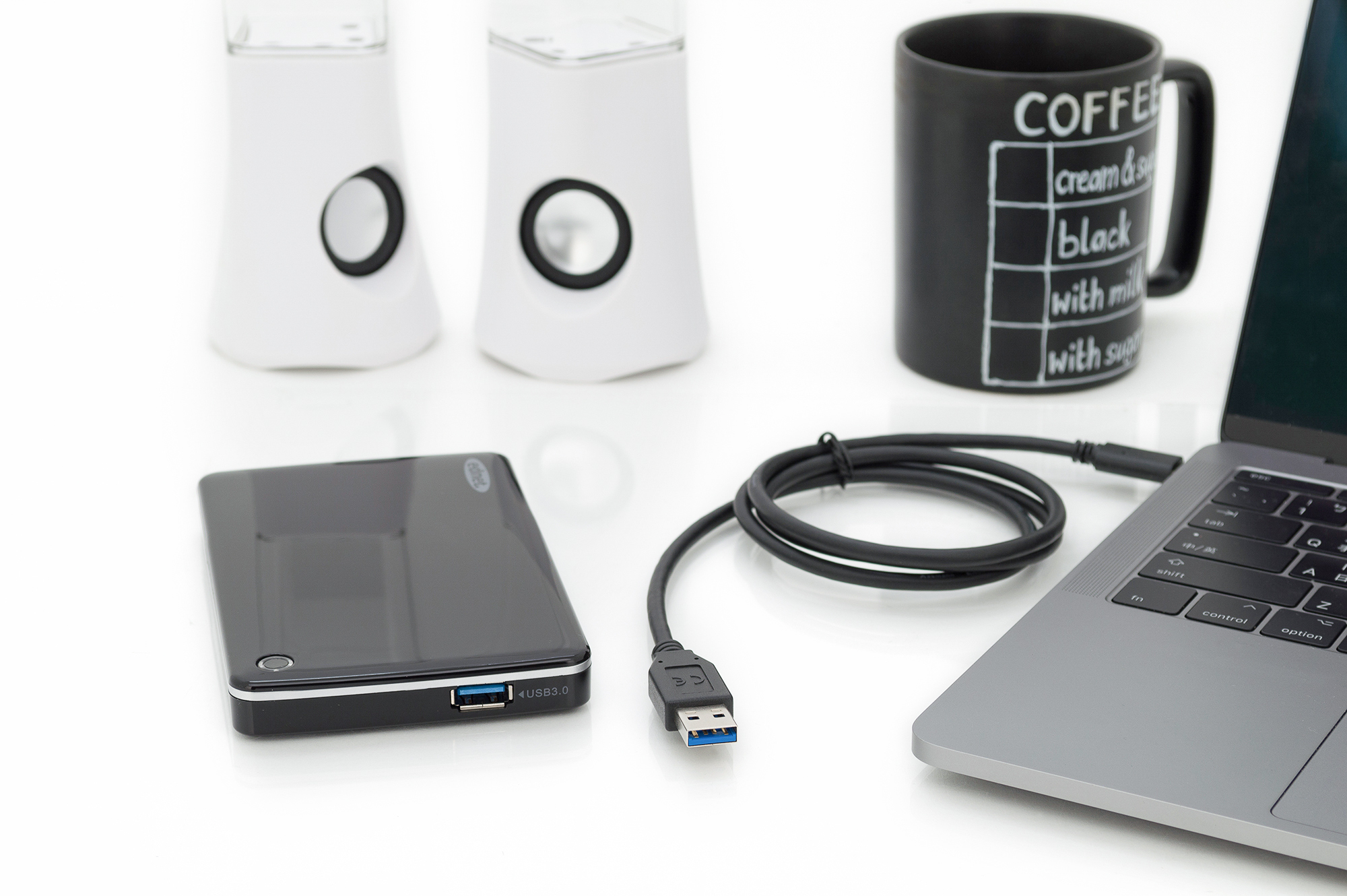 smartphone, power bank, usb cable, laptop, mug